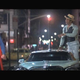 14 years after Verb, and a thousand years ago: BOTH of these gentlemen have totally “bad outfits”. But we all know who the star of this scene is: The CAR.